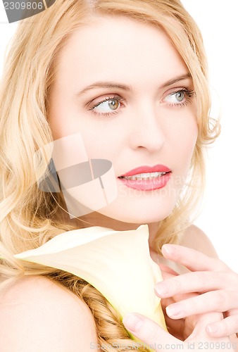 Image of beautiful woman with white flower