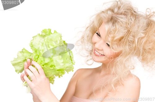 Image of happy woman with lettuce