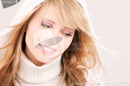 Image of lovely teenage girl in hoodie