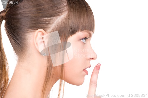 Image of finger on lips