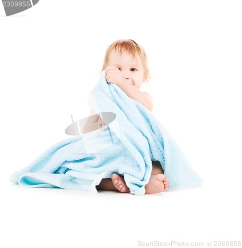 Image of baby with blue towel