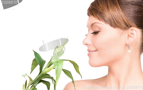 Image of woman with sprout
