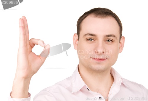 Image of businessman showing ok sign