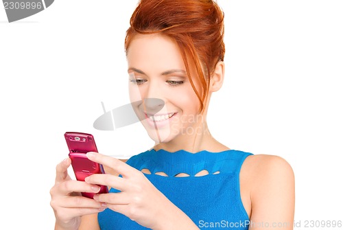 Image of happy woman with cell phone