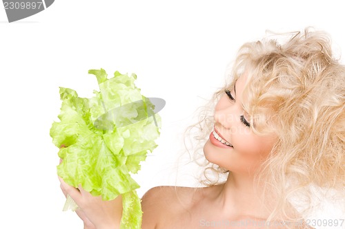 Image of happy woman with lettuce