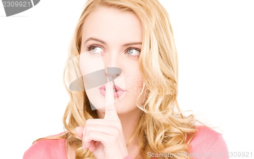 Image of finger on lips