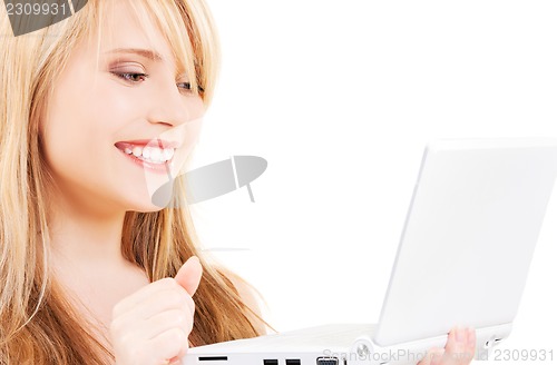 Image of teenage girl with laptop computer
