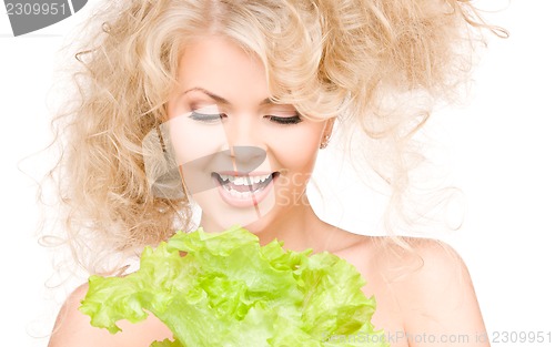 Image of happy woman with lettuce