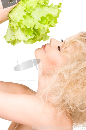 Image of happy woman with lettuce