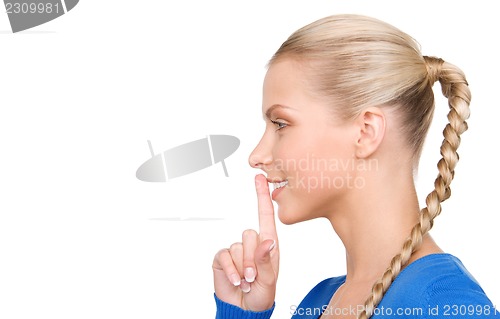 Image of finger on lips