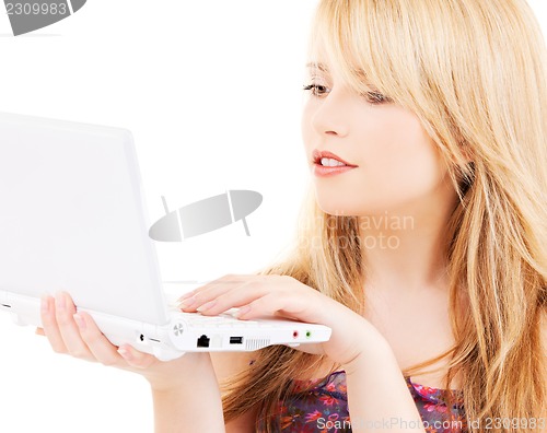 Image of teenage girl with laptop computer
