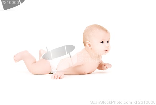 Image of laying baby boy in diaper