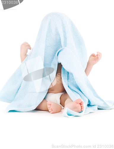 Image of baby with blue towel