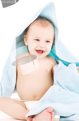 Image of baby with blue towel