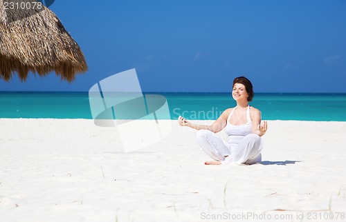 Image of meditation on the beach