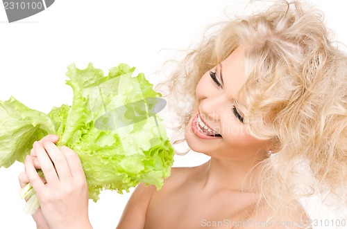 Image of happy woman with lettuce