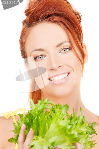 Image of happy woman with lettuce