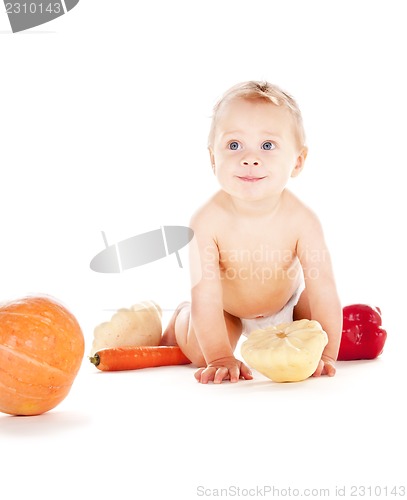 Image of baby boy with vegetables