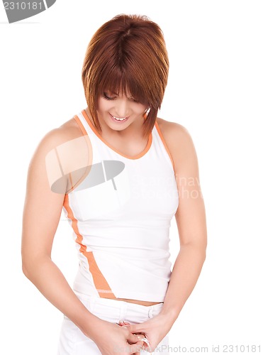 Image of beautiful woman with measure tape