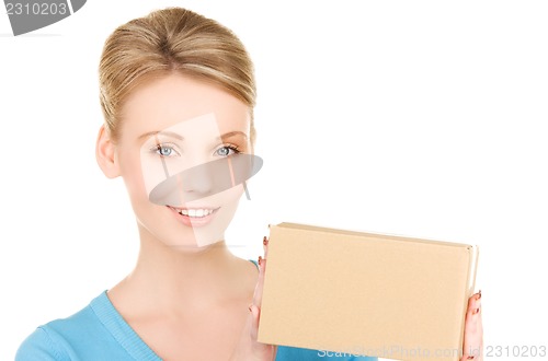 Image of businesswoman with parcel