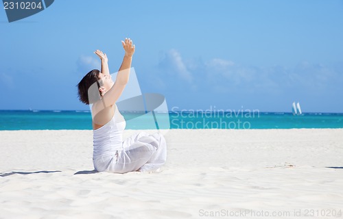 Image of meditation on the beach