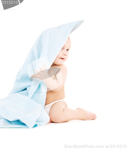 Image of baby with blue towel