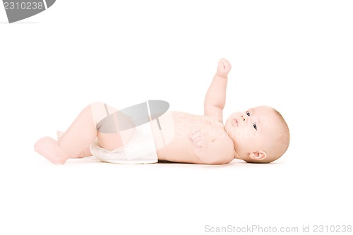 Image of laying baby boy in diaper