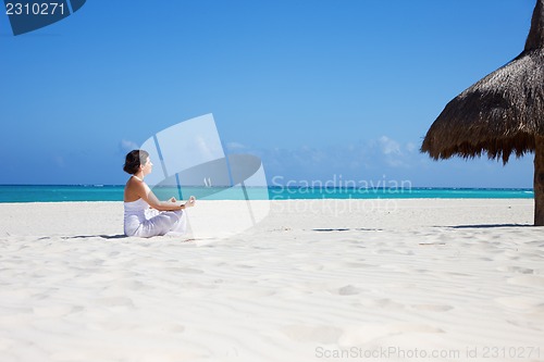 Image of meditation on the beach