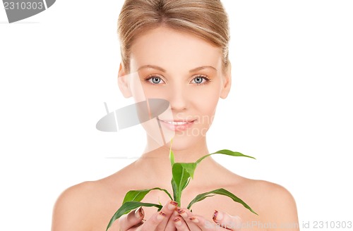 Image of woman with sprout