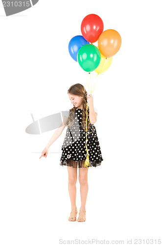 Image of happy girl with colorful balloons