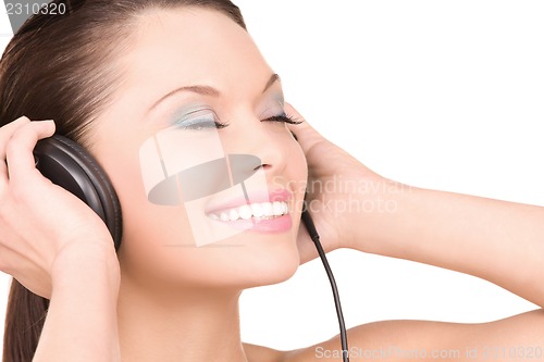 Image of happy woman in headphones