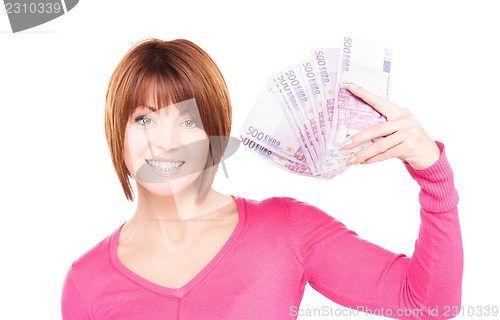 Image of happy woman with money