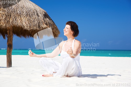 Image of meditation on the beach