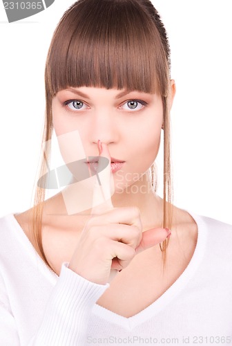 Image of finger on lips