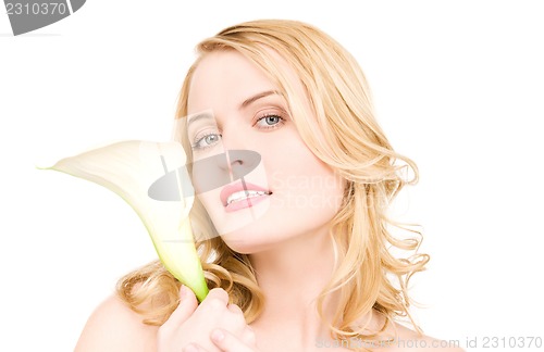 Image of beautiful woman with white flower