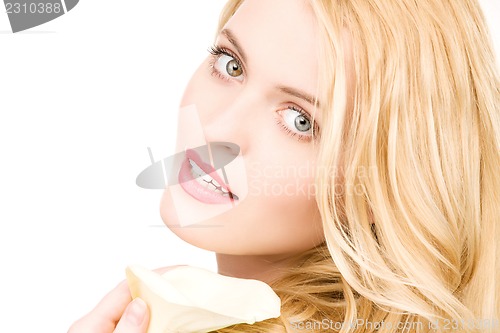 Image of beautiful woman with white flower