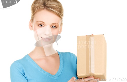 Image of businesswoman with parcel