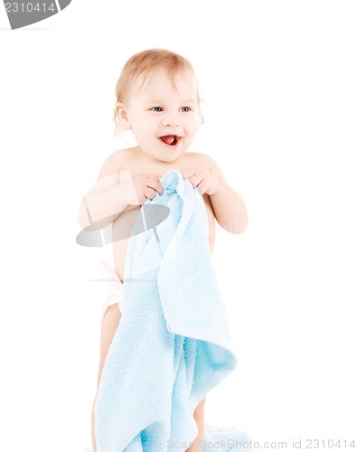 Image of baby with blue towel