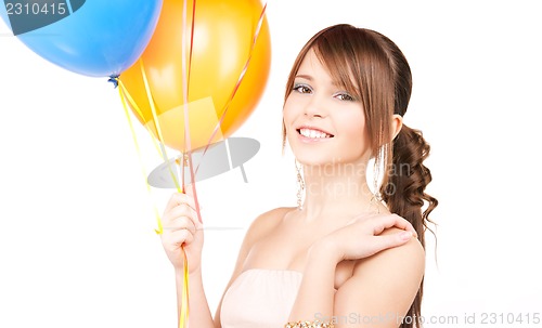 Image of happy teenage girl with balloons