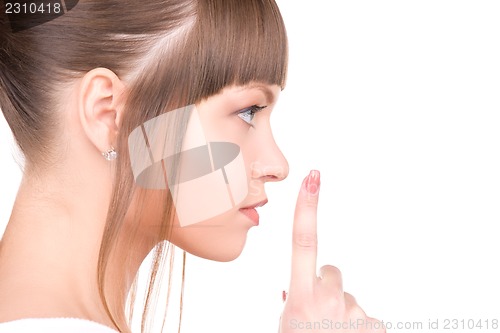 Image of finger on lips