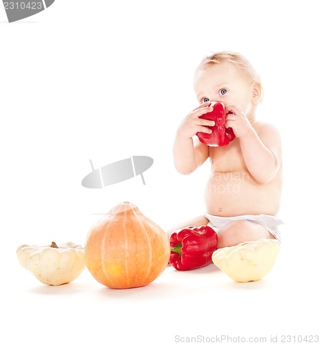 Image of baby boy with vegetables