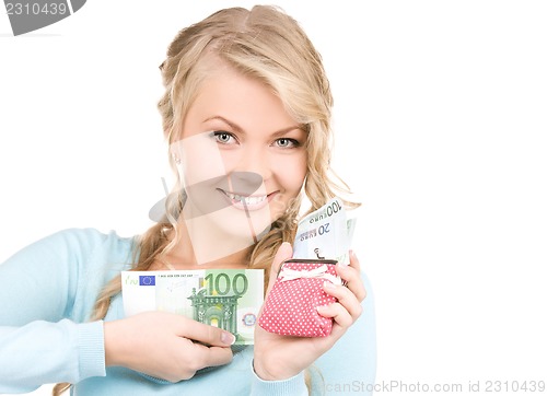 Image of lovely woman with purse and money