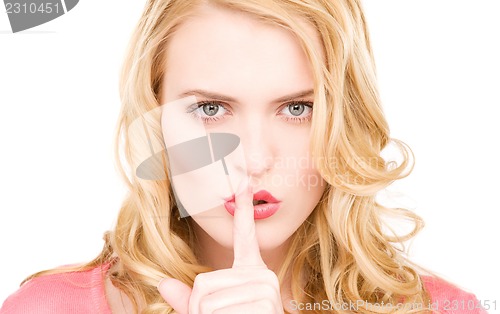Image of finger on lips