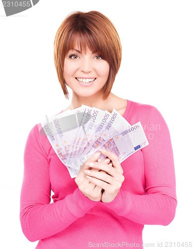 Image of happy woman with money