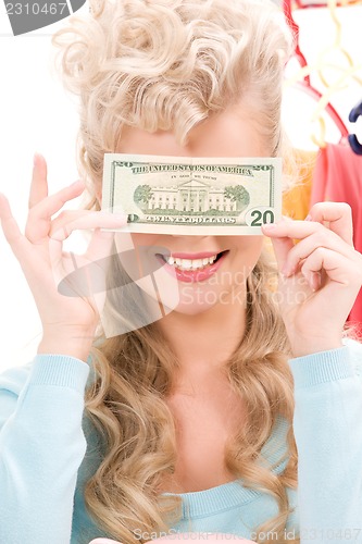 Image of woman with dollar note