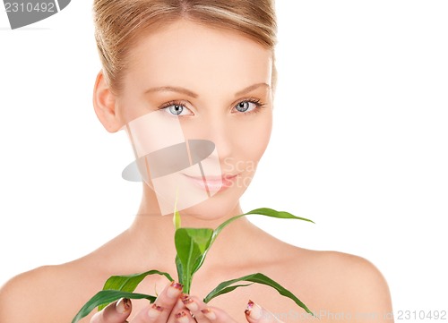 Image of woman with sprout