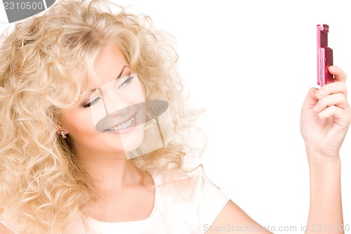 Image of happy woman with cell phone