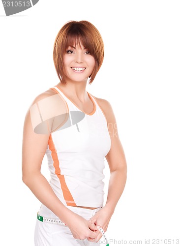 Image of beautiful woman with measure tape