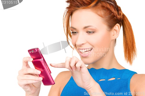 Image of happy woman with cell phone