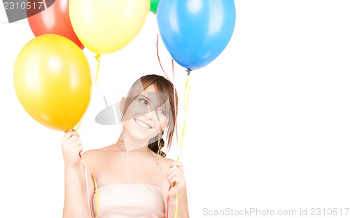 Image of happy teenage girl with balloons